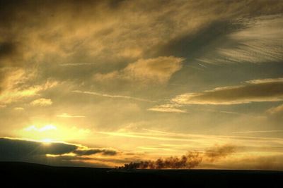 Scenic view of landscape at sunset