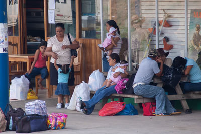 Group of people sitting on the floor