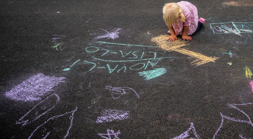 Child playing on street