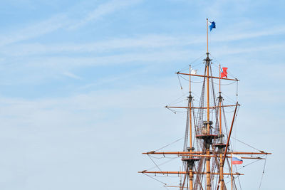 Sailing mast of ship, copy space. sailing vessel main topgallant mast with crows nest. old frigate