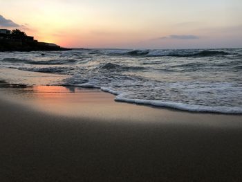 Scenic view of sea against sky during sunset