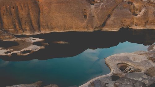 High angle view of tidal pool on rock formation