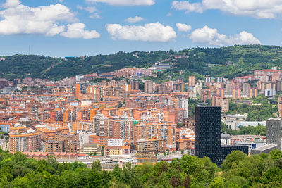 High angle shot of townscape against sky