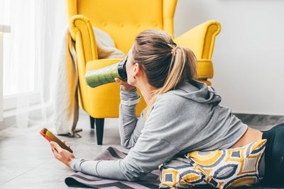 Young woman using mobile phone