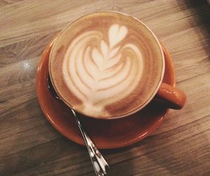 High angle view of cappuccino on table