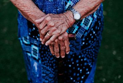 Midsection of woman with hands