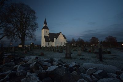 Church against sky during sunset