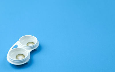 High angle view of drink against blue background