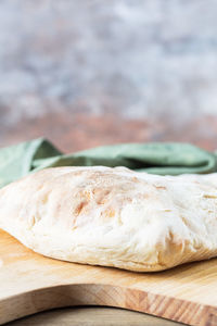 Close-up of bread on cutting board