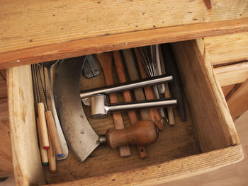 High angle view of kitchen utensils in drawer