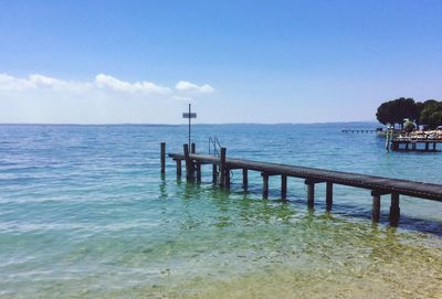 Scenic view of sea against blue sky