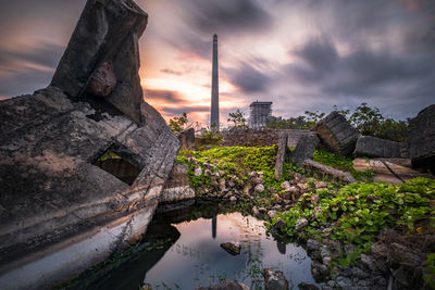 View of old ruin building against cloudy sky