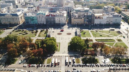 High angle view of crowd by buildings in city
