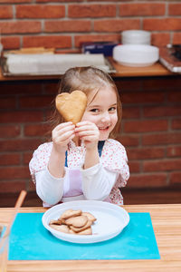 Portrait of a girl holding ice cream