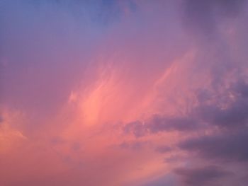 Low angle view of dramatic sky during sunset