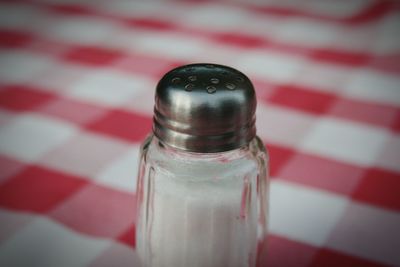 Close-up of drinking glass on table