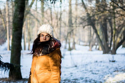 Young woman in park during winter