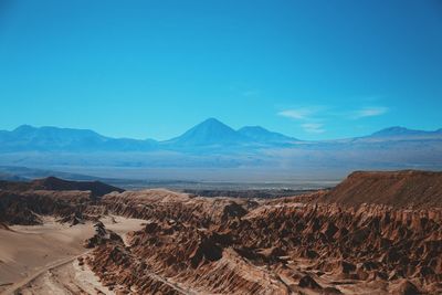 Landscape with mountain in background