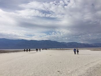 Scenic view of death valley against cloudy sky