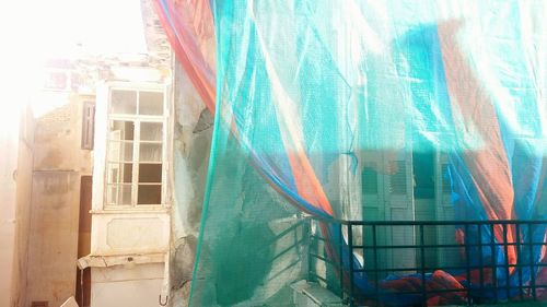 Close-up of multi colored building against sky