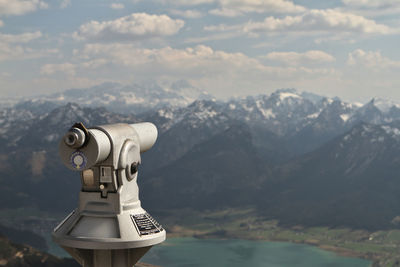 Close-up of mountain range against cloudy sky