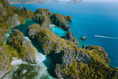 High angle view of rocks by sea