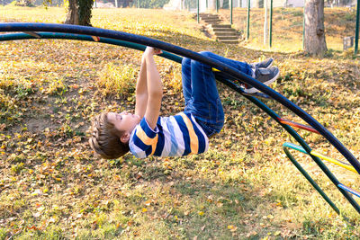 Boy playing in playground