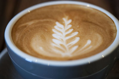 High angle view of cappuccino on table