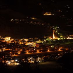 Illuminated cityscape at night