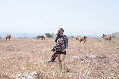 Full length of a horse on a field