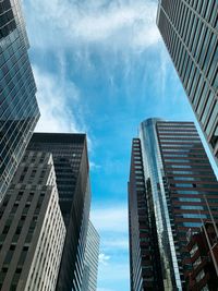 Low angle view of modern buildings against sky