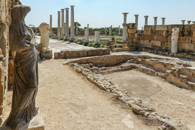 Famagusta, turkish republic of northern cyprus. columns and sculptures at ancient city salamis ruins