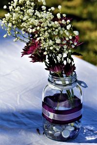 Close-up of flower vase on table