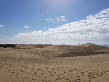 Scenic view of desert against sky