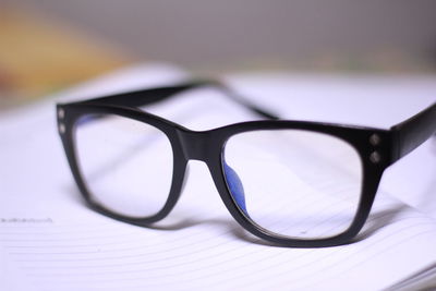 Close-up of eyeglasses on table