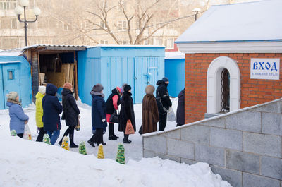 People in front of building