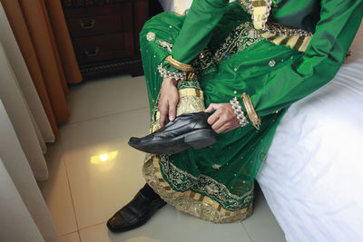 Groom men dressed in bugis customs are preparing before wedding