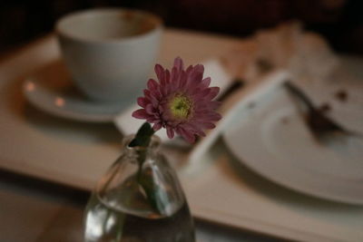 Close-up of flower vase on table