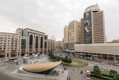 Panoramic view of city buildings against sky