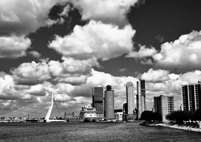 Modern buildings in city against sky