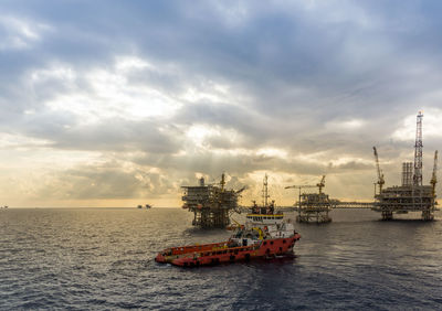 An anchor handling tug boat maneuvering while performing anchor deployment at offshore oil field