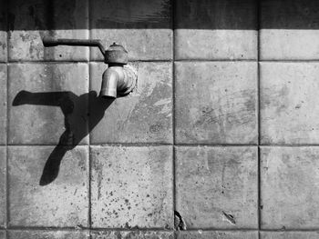 Shadow of man jumping outdoors