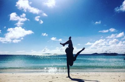 Woman standing on beach