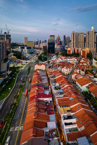 High angle view of buildings in city against sky