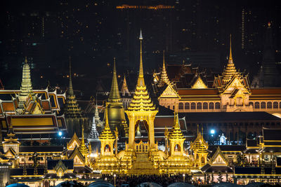 Illuminated temple building at night
