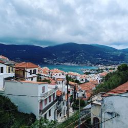 High angle view of townscape against cloudy sky