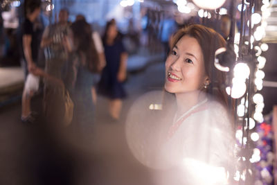 Portrait of smiling young woman