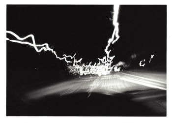 Cars moving on road at night