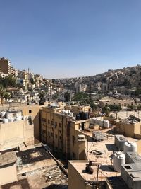 High angle shot of townscape against clear sky