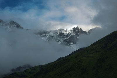 Scenic view of volcanic mountain against sky